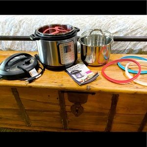 Instant Pot Duo Plus pressure cooker with accessories